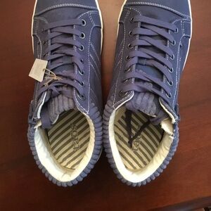 Brand new Taos Start up sneaker in distressed indigo.  Size 10